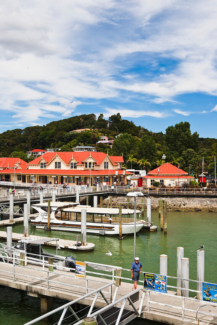 'Buildings And Boats At The Waterfront In The Port Of Paihia, Bay Of Islands; New Zealand'