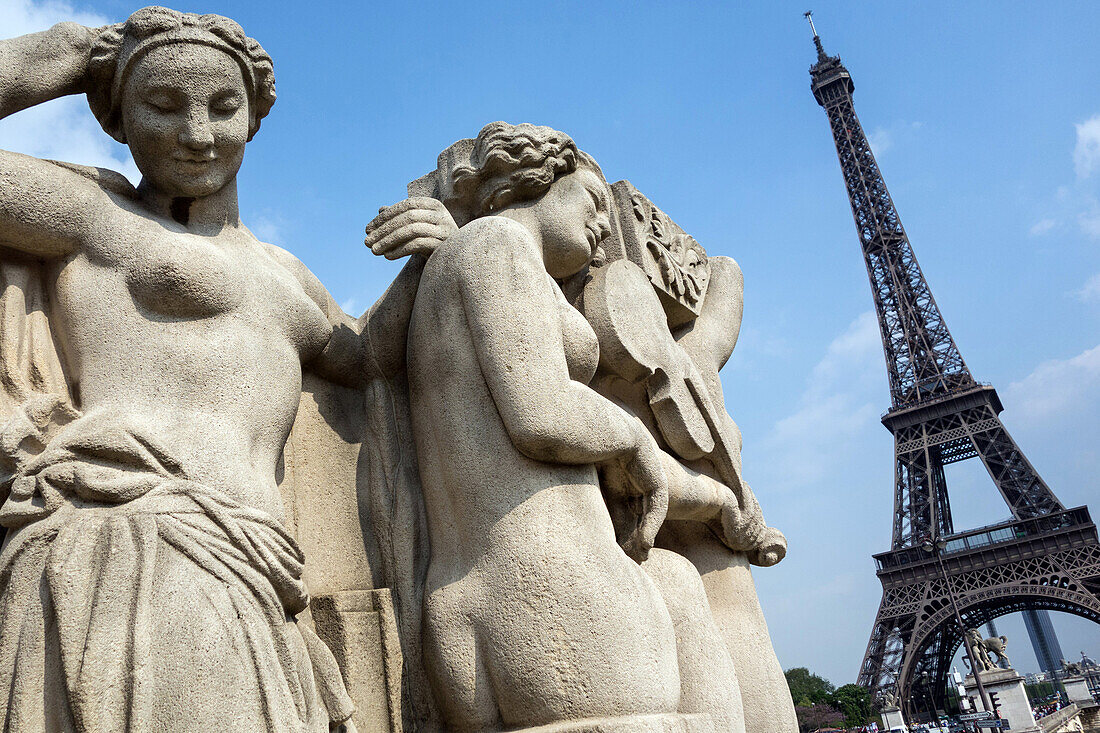 Statues of nude women in the trocadero garden, la joie de vivre 1937, made by leon-ernest drivier for the world expo, and the eiffel tower, paris, 16th arrondissement, france