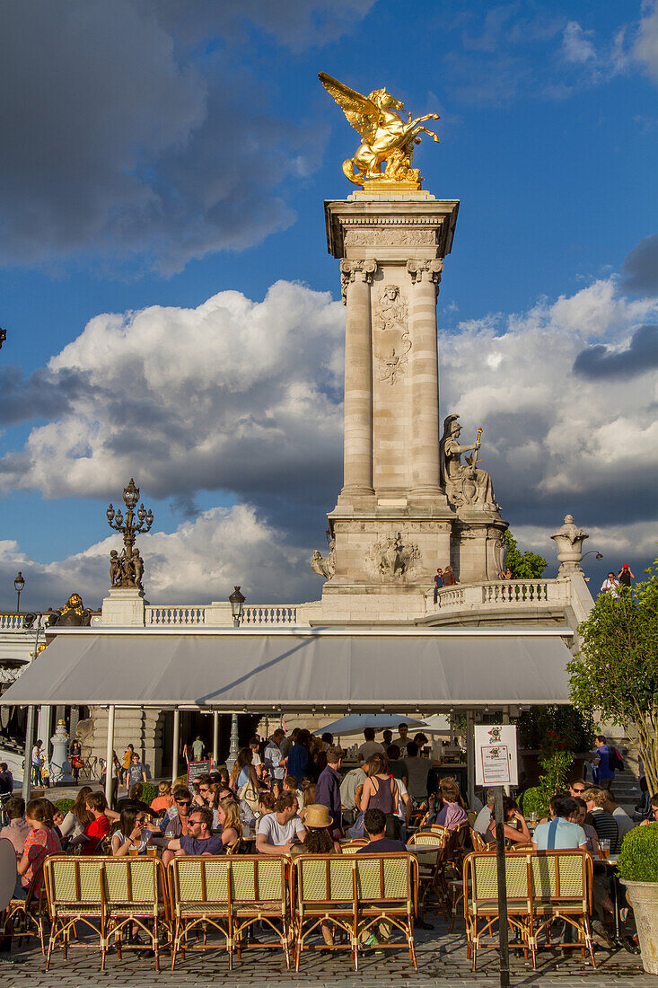 Sidewalk cafe at the foot of the pont alexandre iii bridge, banks of the seine, urban management program of the right and left banks to create leisure and recreational spaces, 7th arrondissement, paris, france