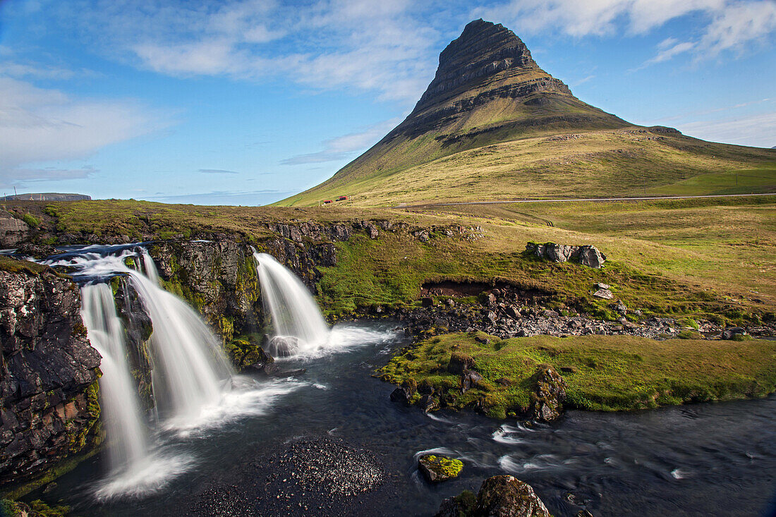 Mount kirkjufell and its waterfalls, geothermal zone of the snaefellsnes peninsula, northwest iceland, europe