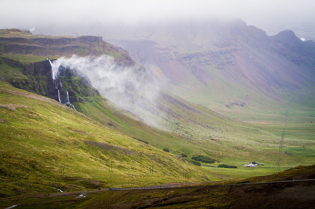 Isolated farm at the foot of the mountains, snaefellsnes peninsula, northwest iceland, europe