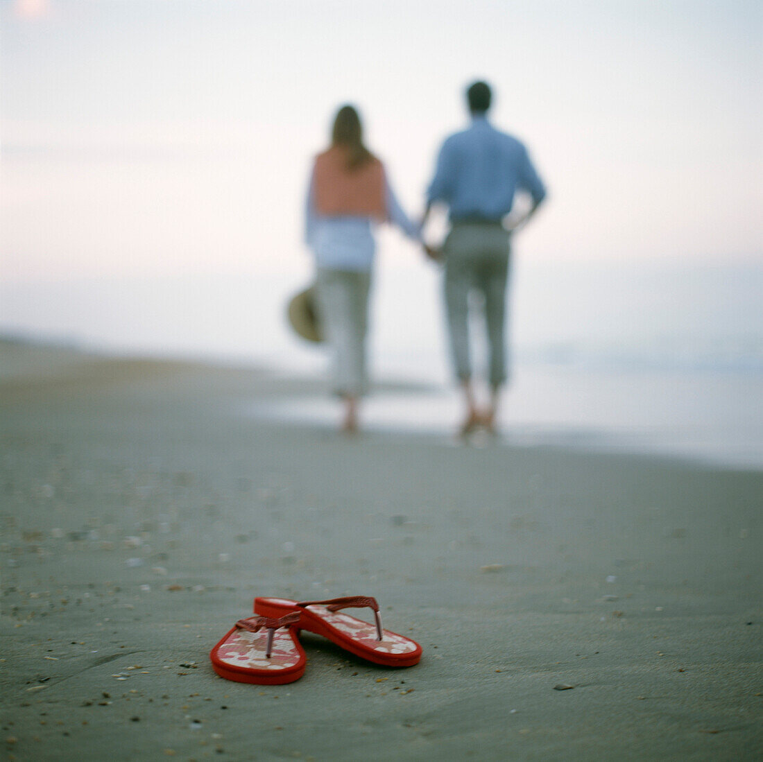 Couple Walking on Beach