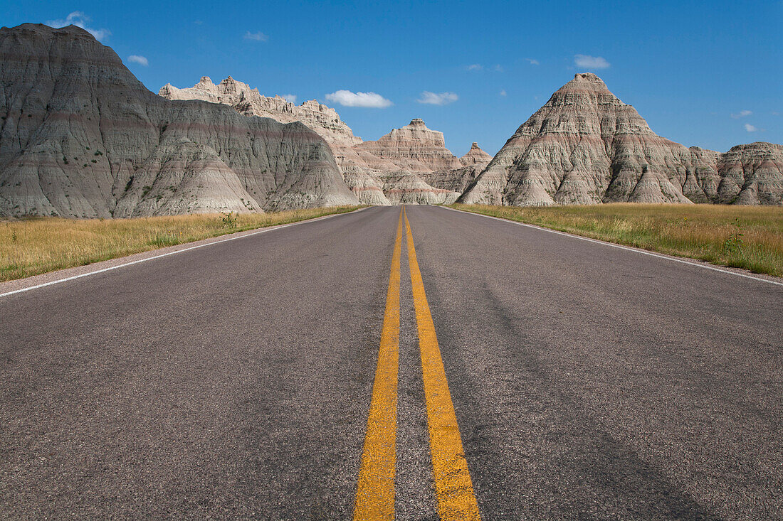 Straight Road Leading to Mountain Range, Badlands, South Dakota, USA