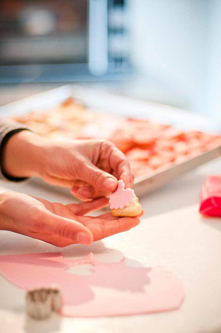 Woman Making Heart-Shaped Cookies