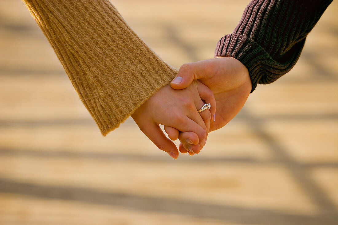 Couple Hold Hands