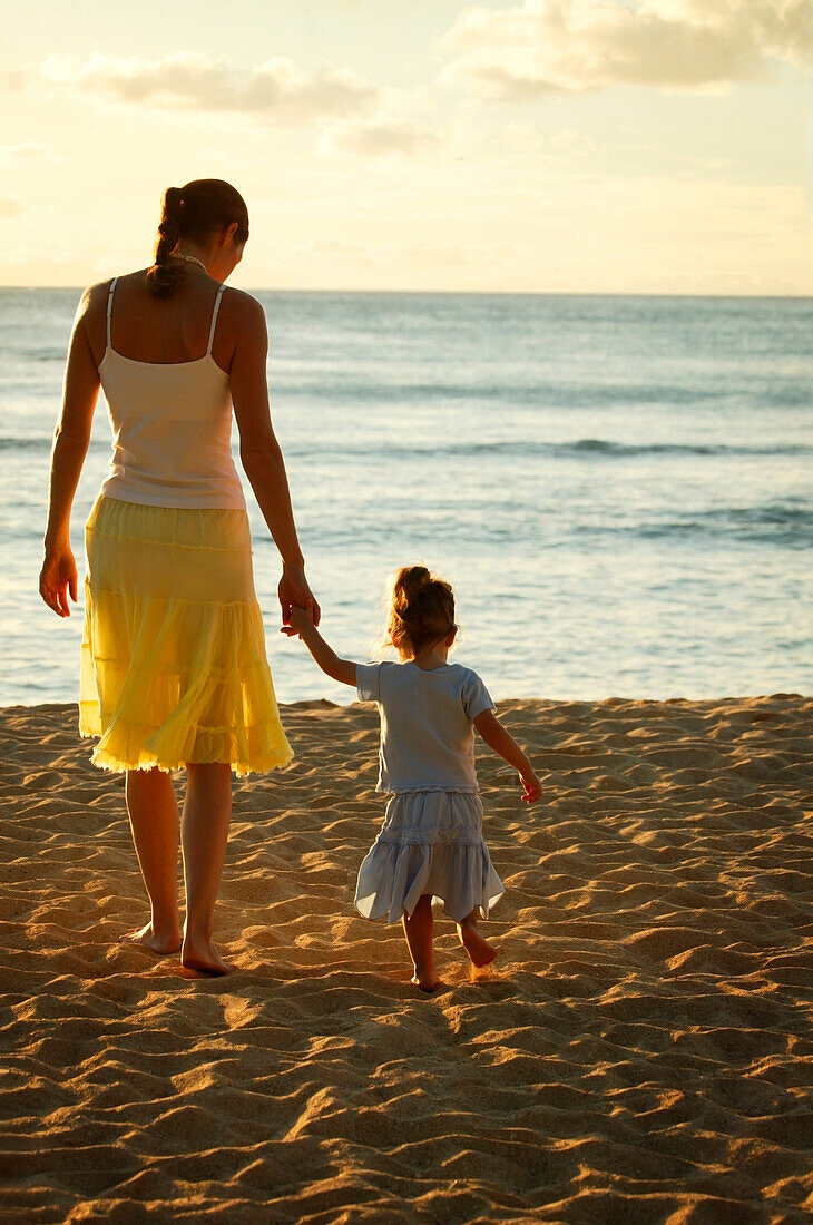 Mother And Daughter At The Beach