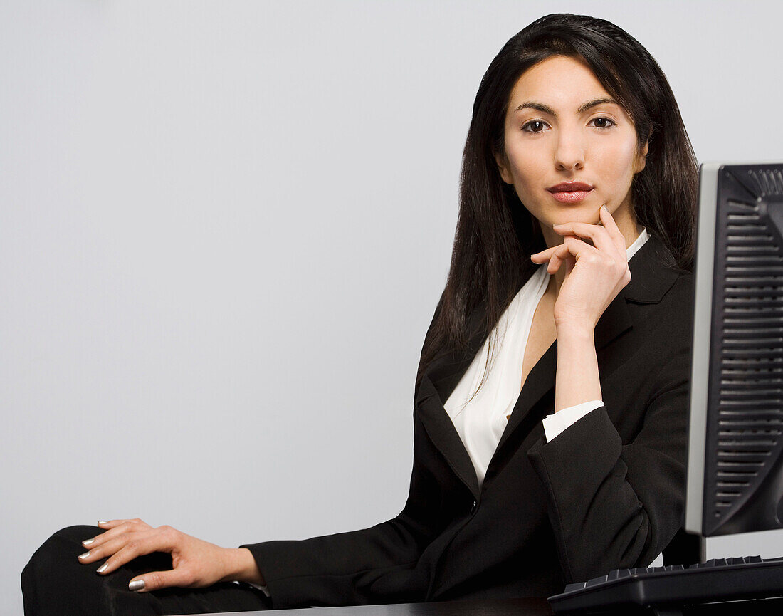 Woman Sitting At Computer