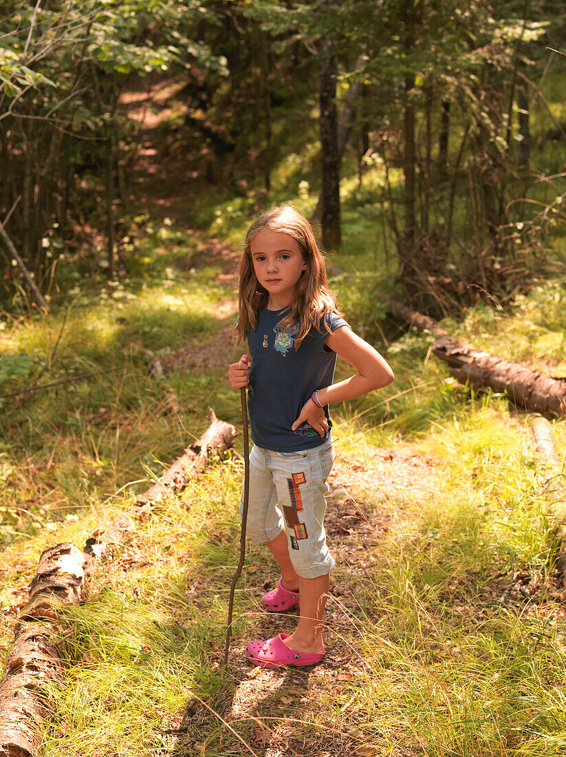 Girl Walking In Woods