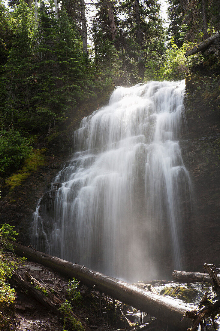 'Waterfalls Flowing Down A Rock Cliff; Waterton, Alberta, Canada'