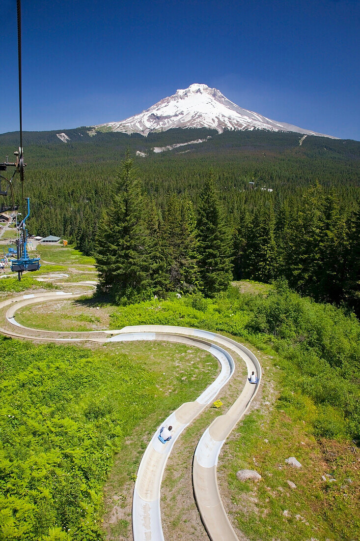 'A Chair Lift And A Track With A View Of Mount Hood In The Oregon Cascades; Oregon, United States Of America'