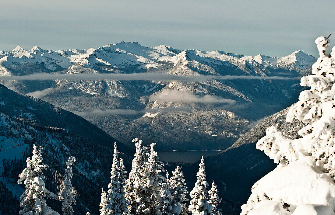 Canada, British Colombiasnowy landscape, lake and mountain