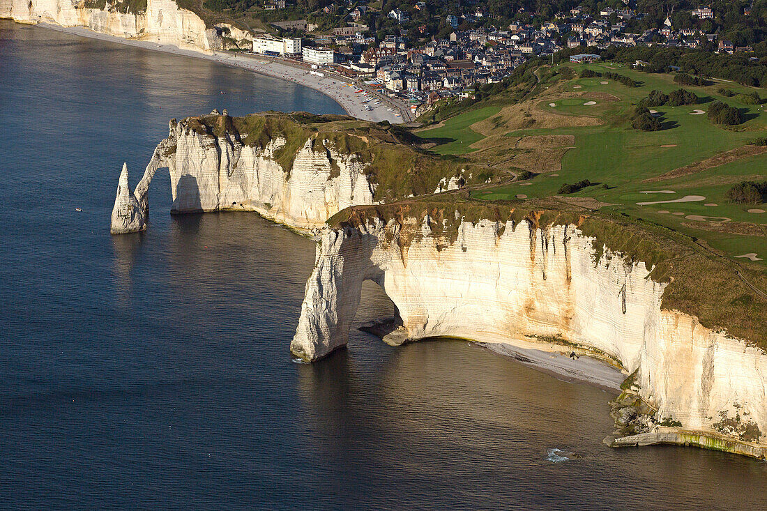 France, Seine-Maritime (76), Etretat, limestone cliffs have made it a place of international tourism (aerial view)