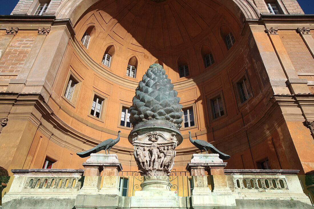 Sculpture of a pine cone and two bronze peacocks. Court of the Pigna. Vatican Museum. Rome. Italy.