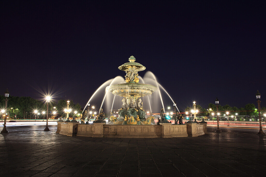 France, Paris, fountain on the Place de la Concorde at night