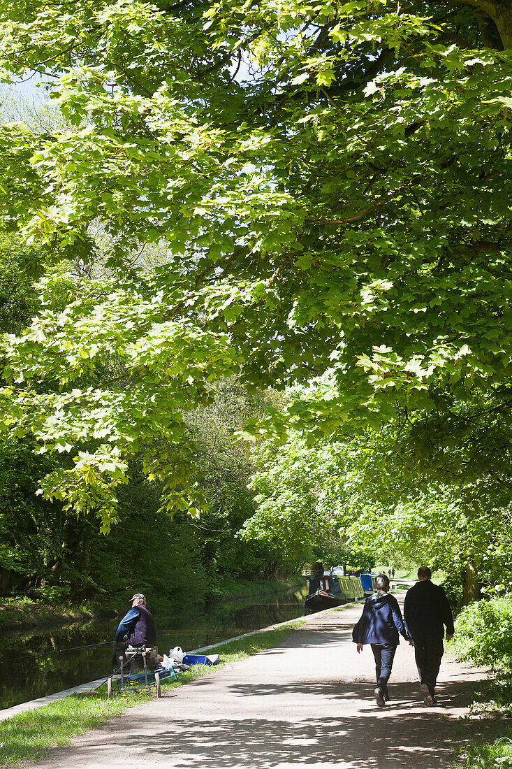 'Walking along path next to Kennet and Avon Canal; Wiltshire, England'
