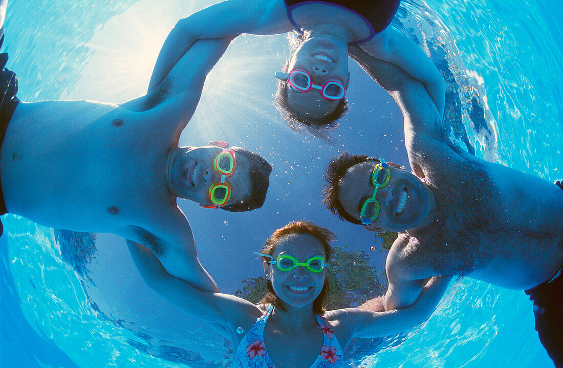 Four Adults In Swimming Pool