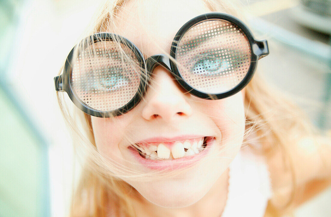 Young Girl With Funny Glasses