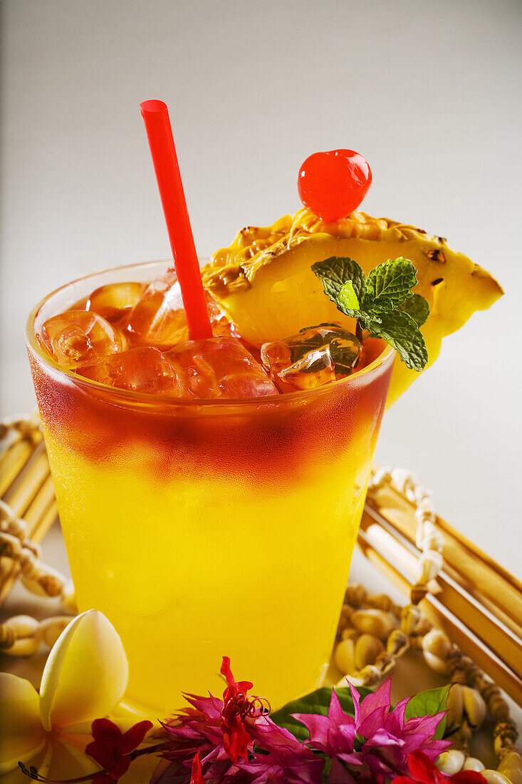 A Mai Tai Garnished With Pinapple And A Cherry.