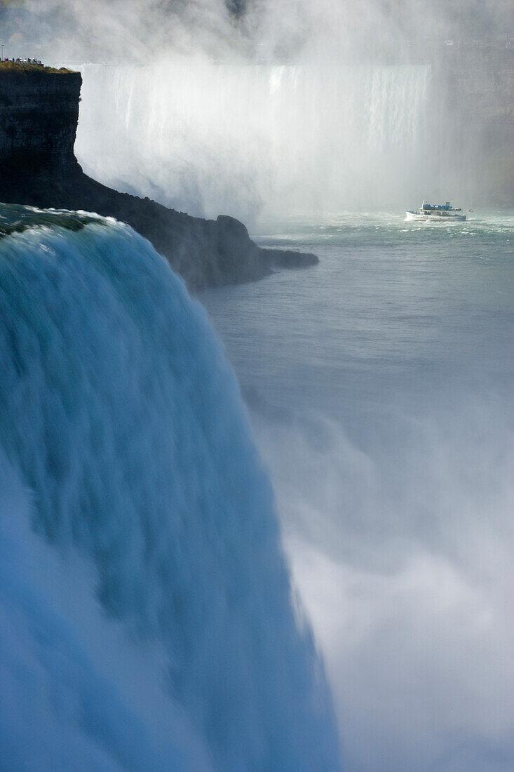 The American Falls With Horseshoe Falls And The Maid Of The Mist In The Background - Niagara Falls, New York, Usa