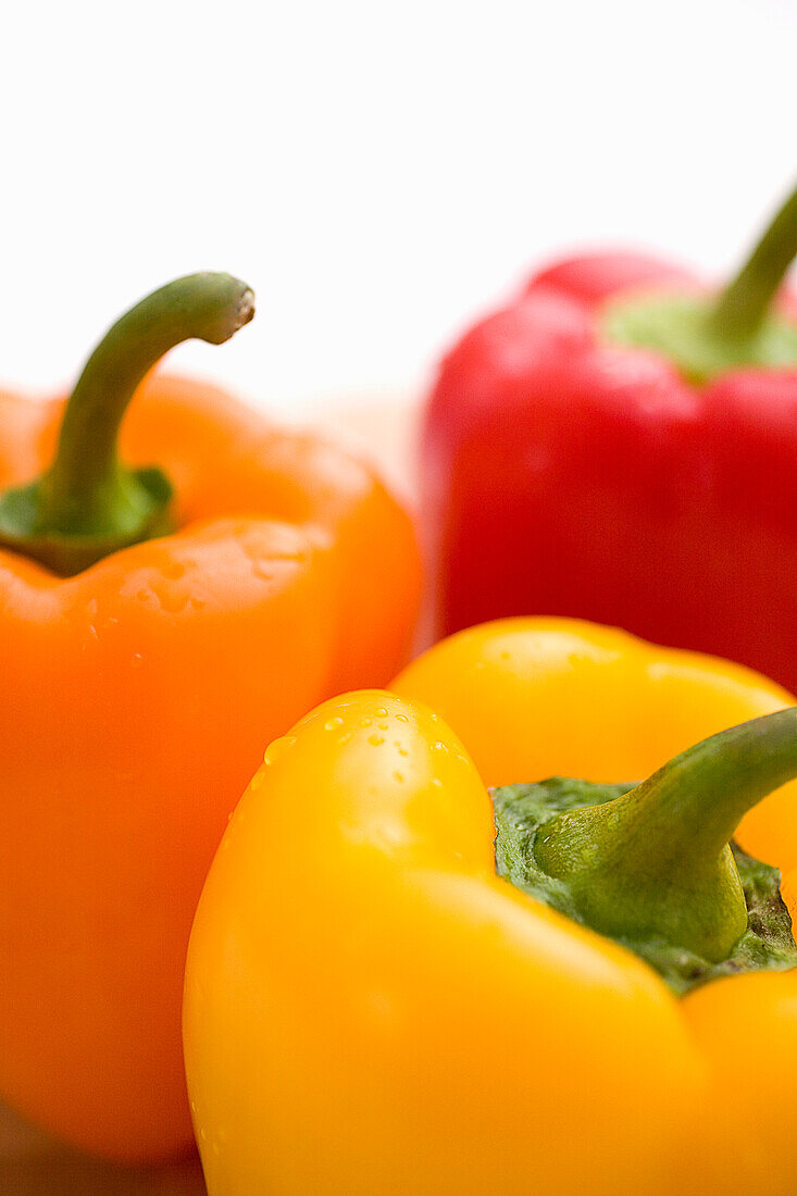 Close-Up Of Yellow, Orange And Red Peppers