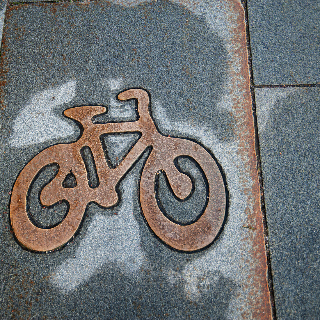 'Image Of A Bicycle On A Sidewalk; Stockholm, Sweden'