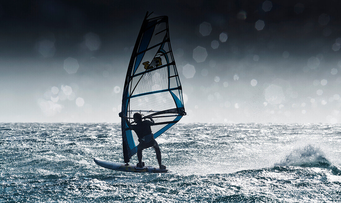 'Windsurfing With Water Drops On Camera Lens; Tarifa, Cadiz, Andalusia, Spain'