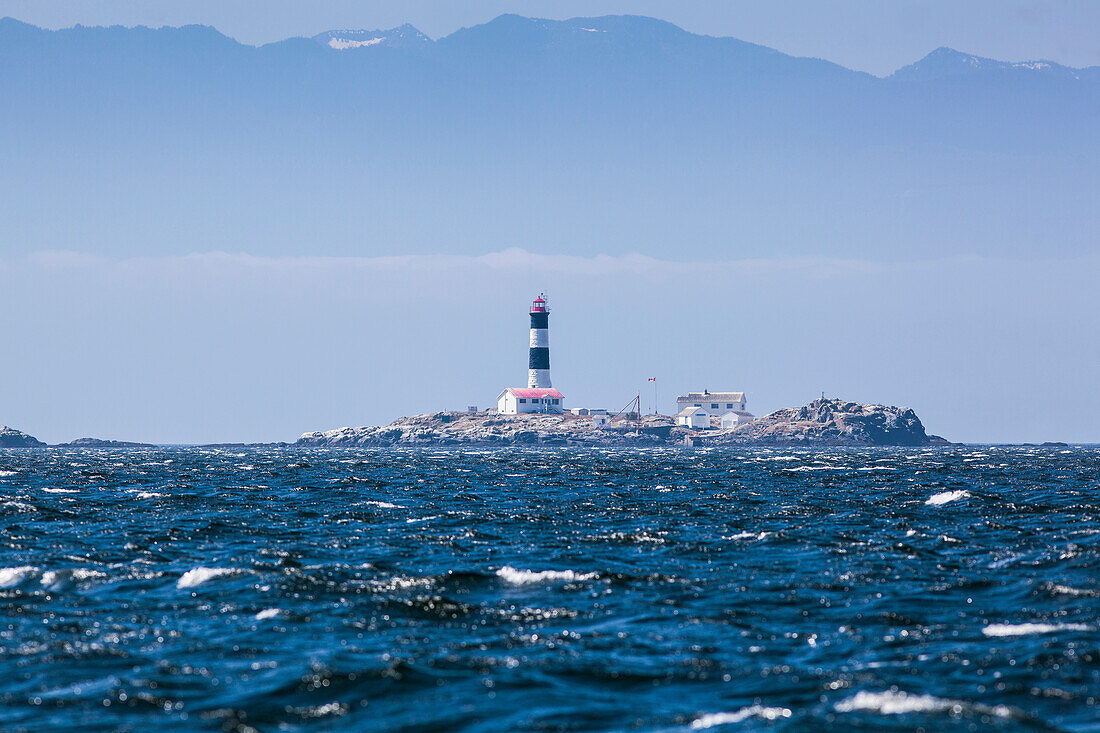 'Race rocks lighthouse is situated on the juan de fuca strait near the southern tip of vancouver island;British columbia canada'