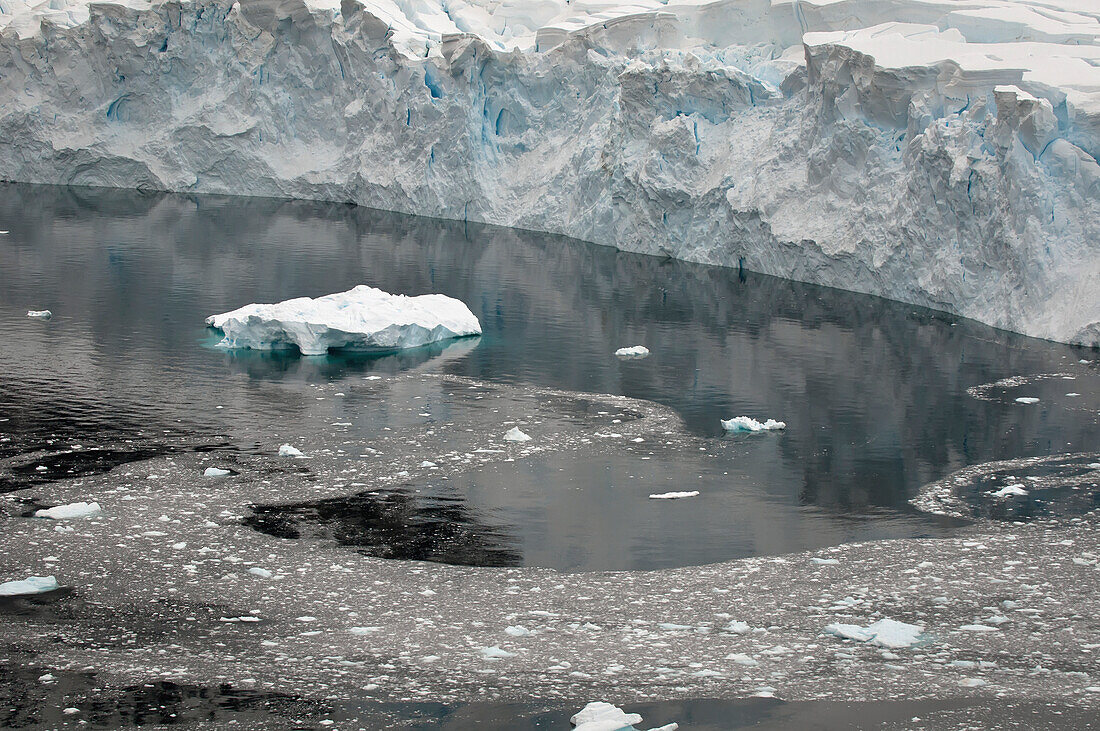 'An iceberg floating in the ocean along the coast;Antarctica'