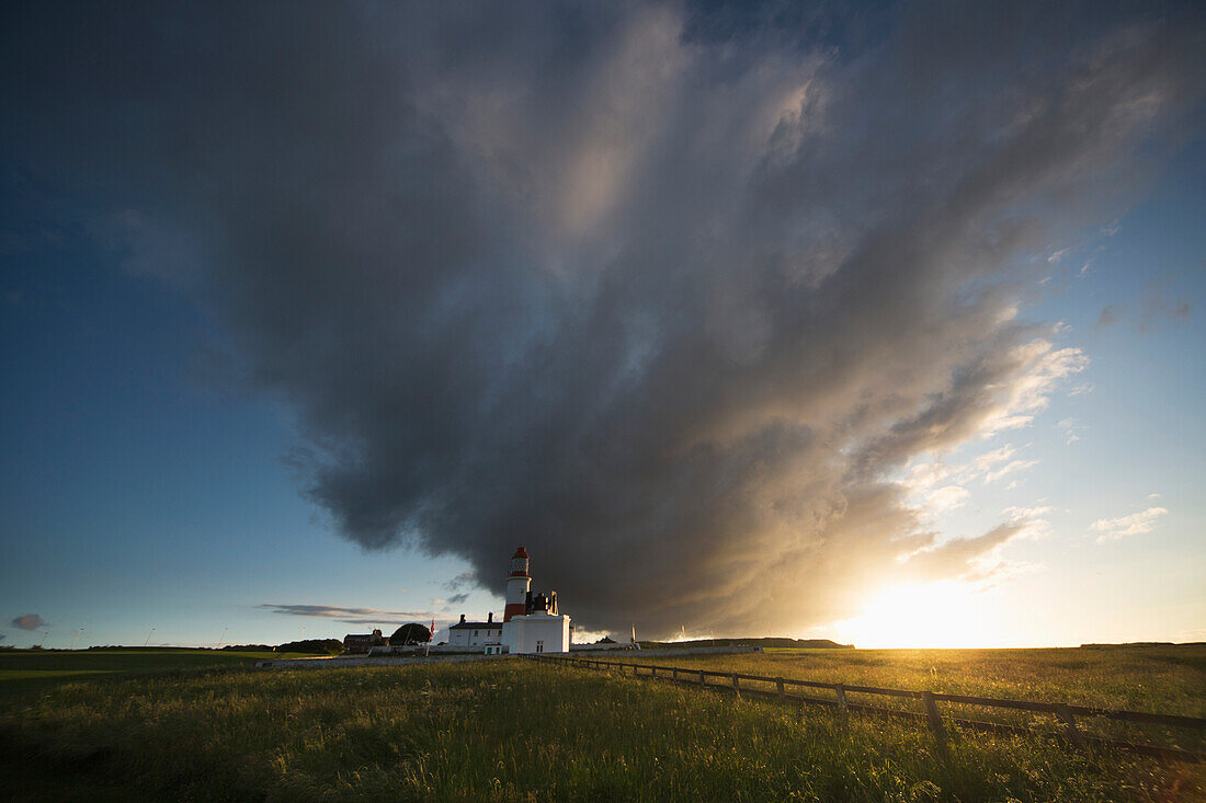 'Souter lighthouse with a cloud formation above it at sunrise;South shields tyne and wear england'