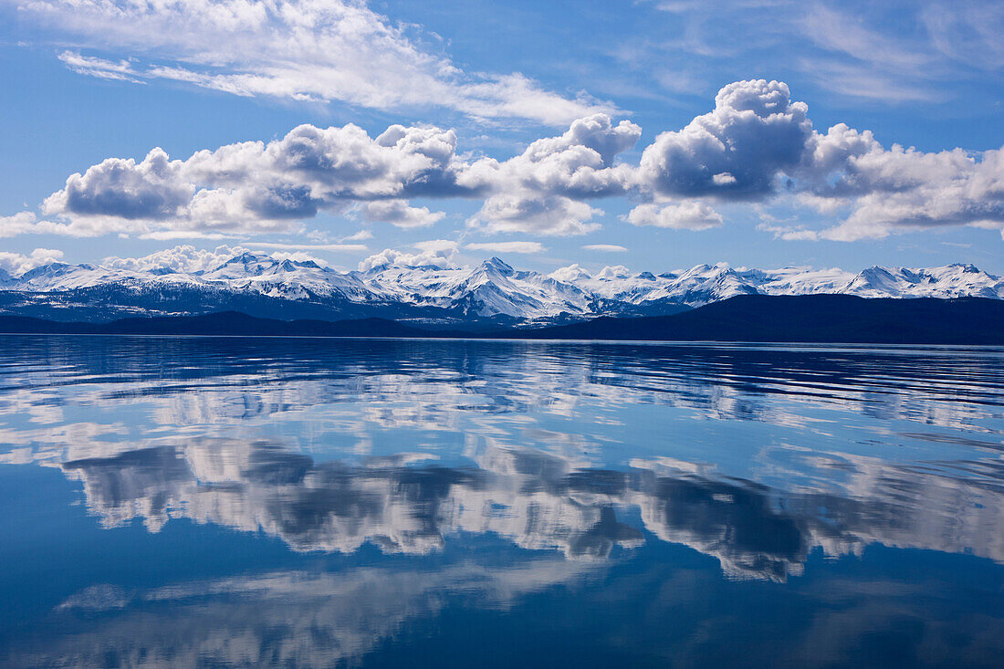 Scenic View Of The Chilkat Mountains Reflecting In Lynn Canal, Inside Passage, Juneau, Southeast Alaska, Spring