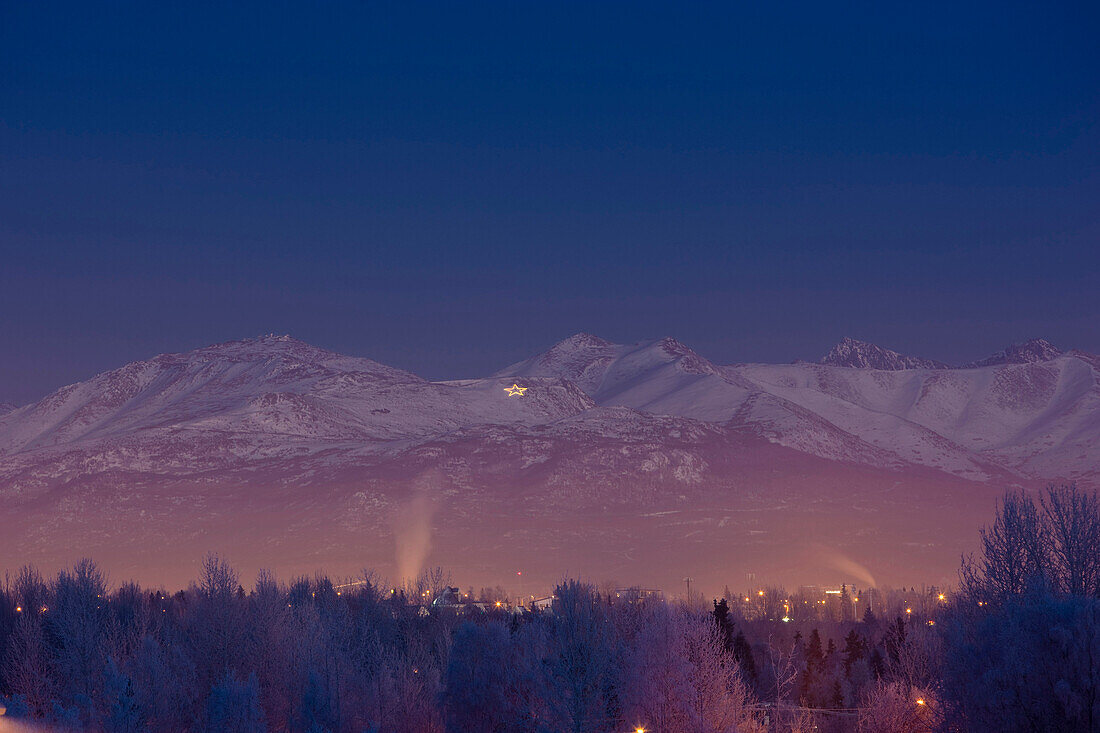 View Of The Chugach Mountains At Twilight With The Site Summit Star Visible Atop Mount Gordon Lyon During Winter, Anchorage, Southcentral Alaska