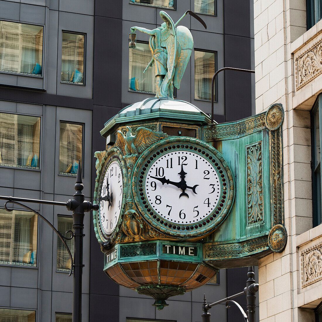 'Clock mounted on the side of a building;Chicago illinois united states of america'