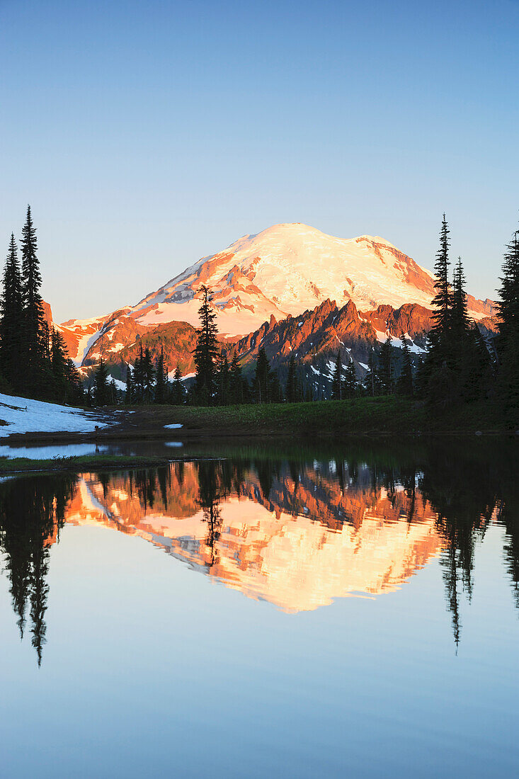 'Mount rainier reflected in a pond at sunrise near tipsoo lake mount rainier national park;Washington united states of america'