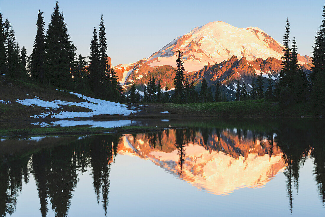 'Sunrise over a small reflecting pond near tipsoo lake mount rainer national park near seattle;Washington united states of america'