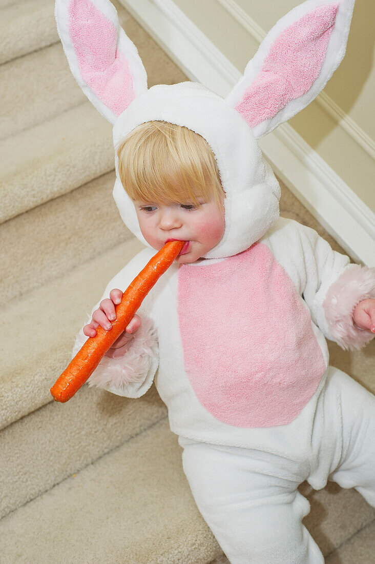 'Baby girl dressed in rabbit costume;Millet alberta canada'