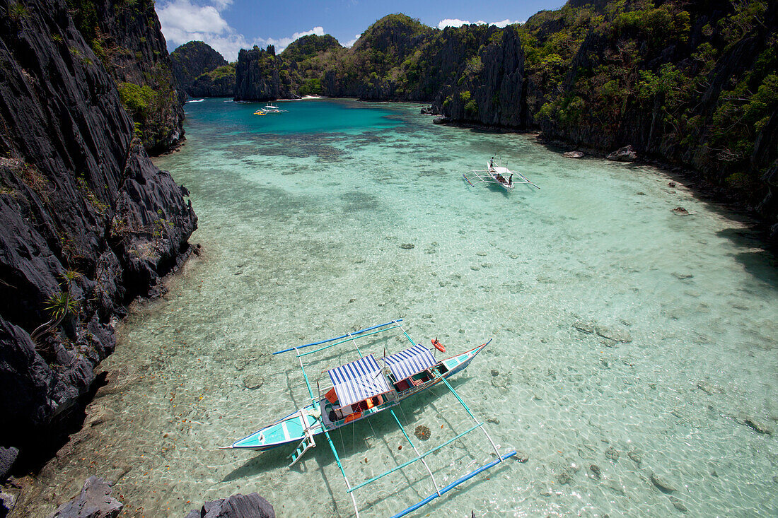 'Bangka Boats In The Small Lagoon On Miniloc Island, Near El Nido; Bacuit Archipelago, Palawan, Philippines'