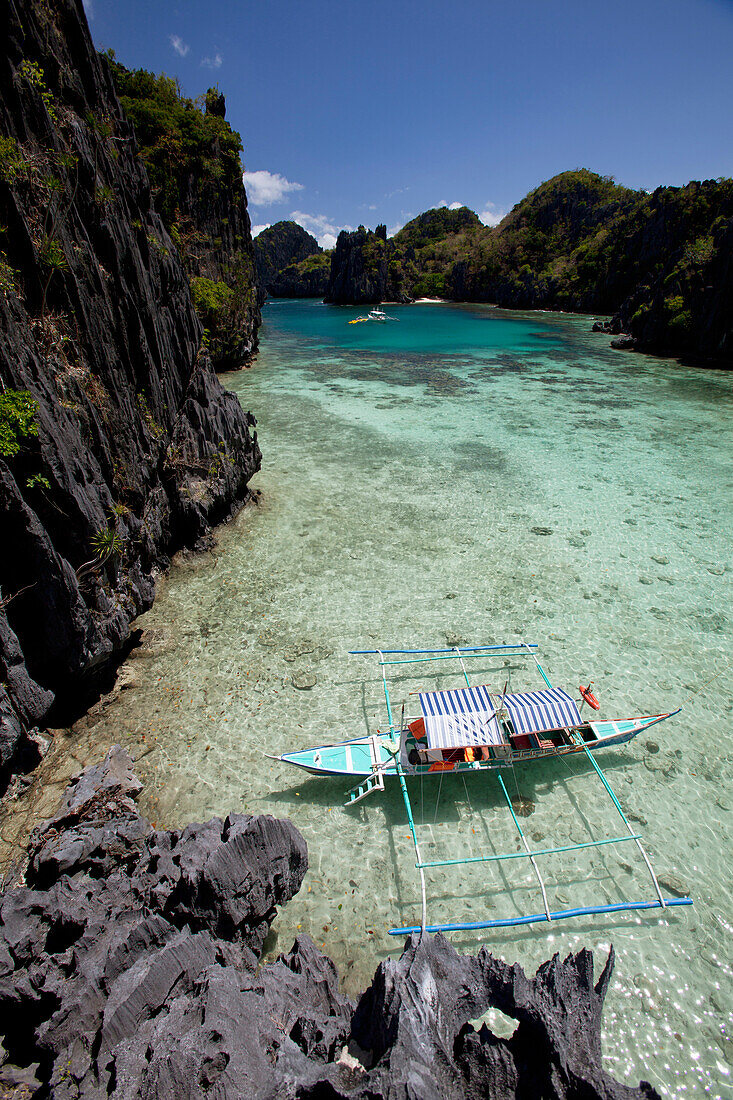 'Bangka Boats In The Small Lagoon On Miniloc Island, Near El Nido; Bacuit Archipelago, Palawan, Philippines'