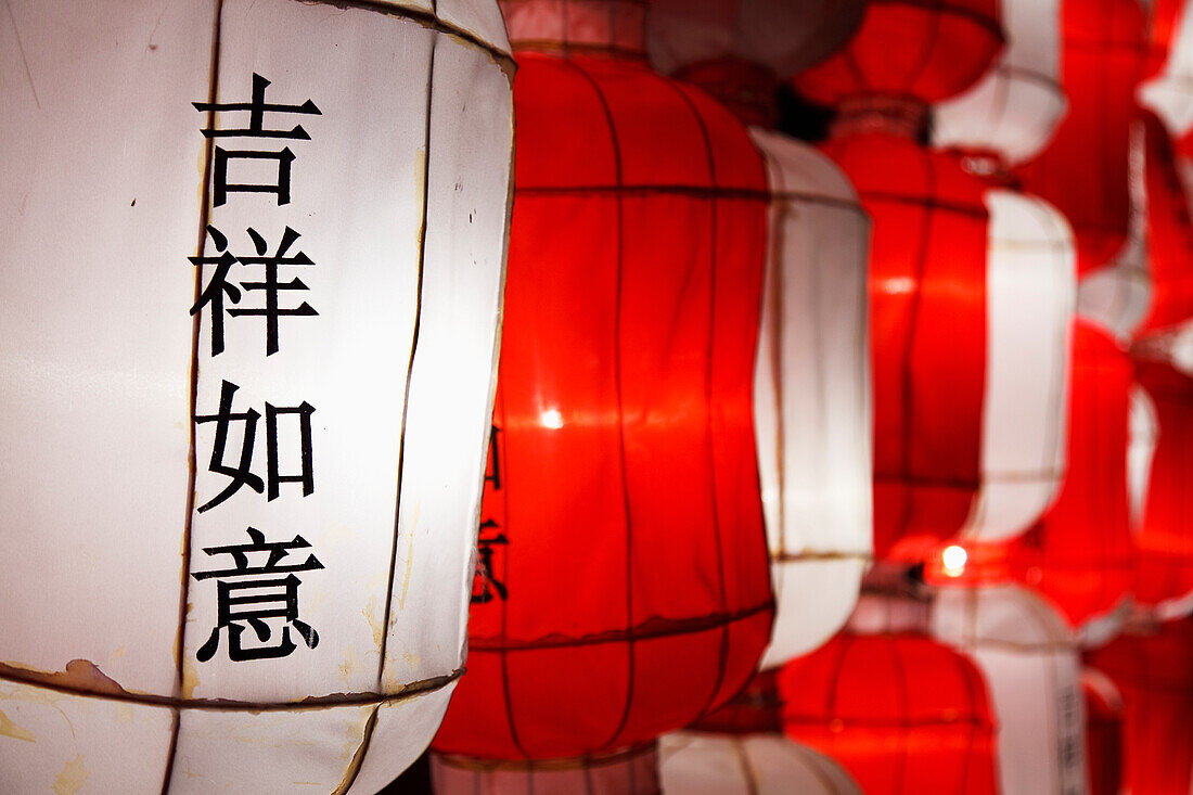 'Red And White Chinese Lanterns Saying 'Good Luck' In The Chinese Language; Chiang Mai, Thailand'