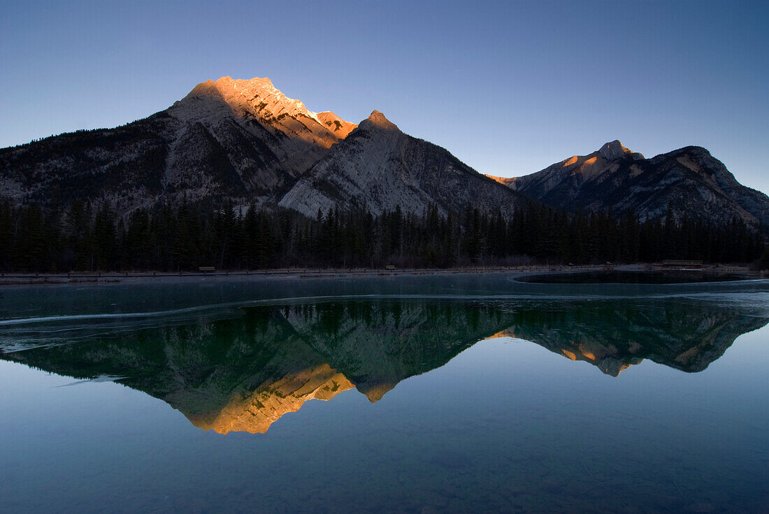 Mirror Image Of A Mountain In Water, Mount Lorette, Kananaskis, Alberta, Canada