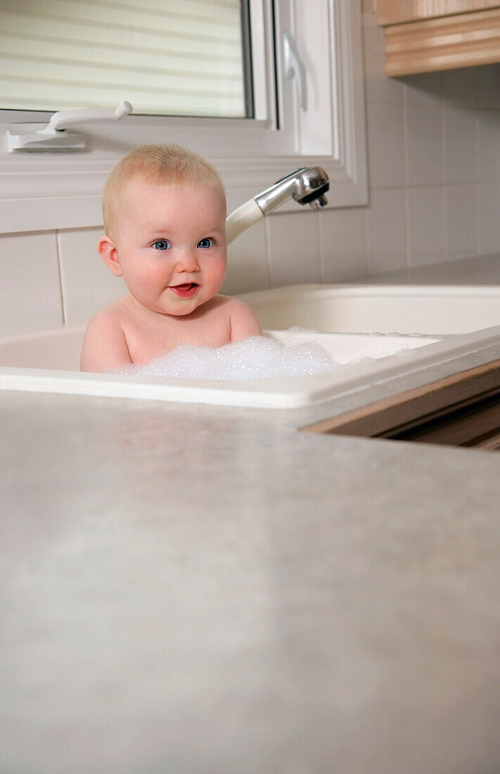 Baby In The Kitchen Sink