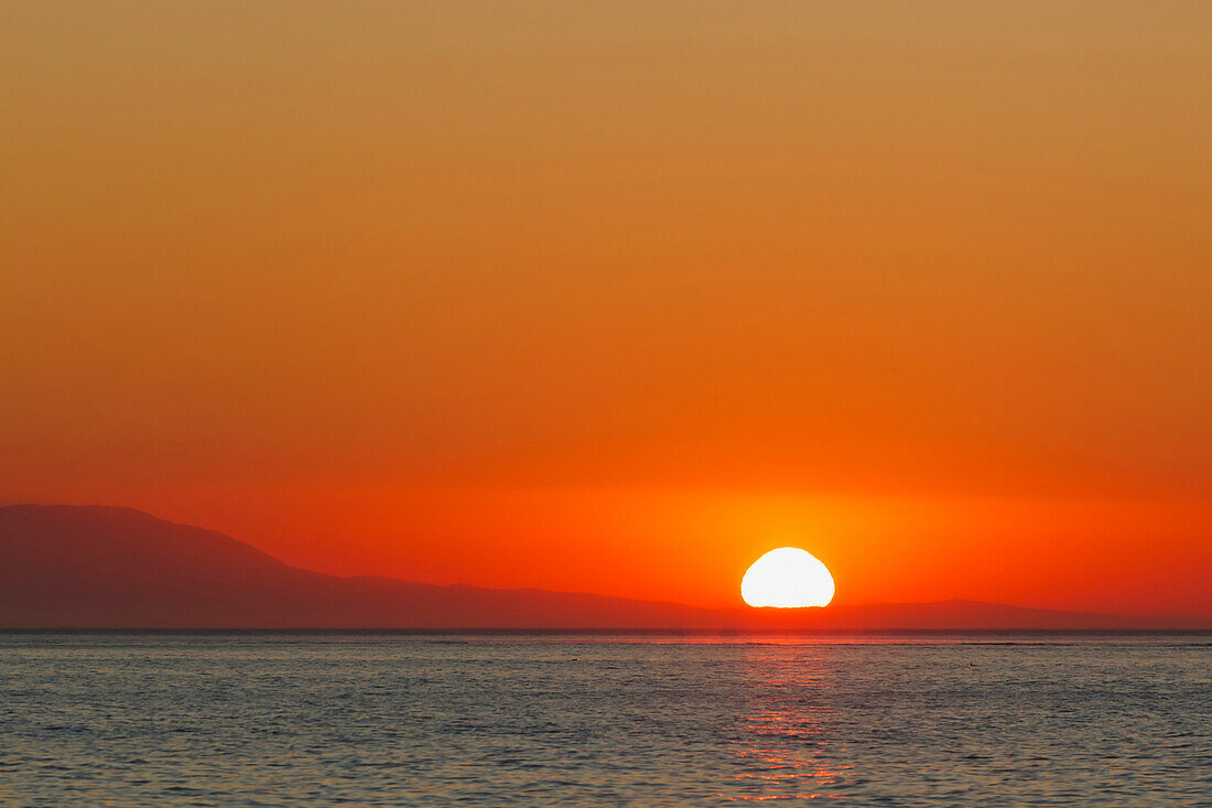 'Sunrise Over Malaga Bay; Torremolinos, Costa Del Sol, Malaga Province, Spain'