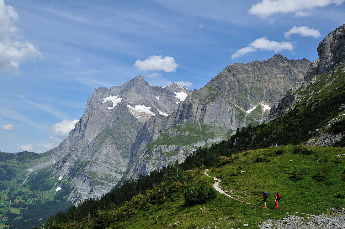 Two mountaineers on the way uo to Ostegghuette, Bernese Alps, Switzerland