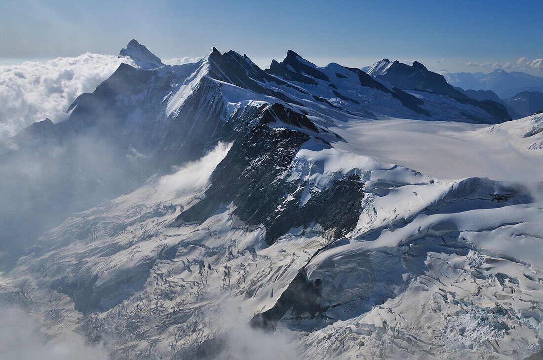 View from the summit of Eiger (3970 m), Finsteraarhorn and Ewigschneefeld in the background, Bernese Alps, Switzerland