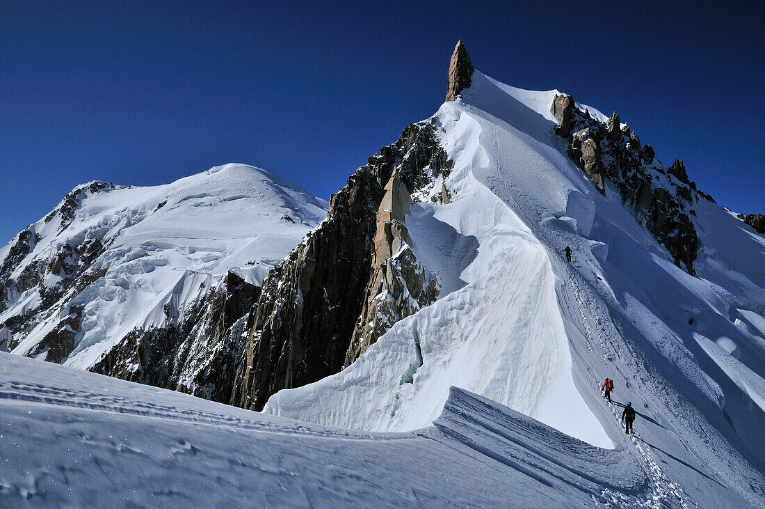 Mountaineer on the ridge of Tour Ronde, Mont Maudit, Mont Blanc Group, France