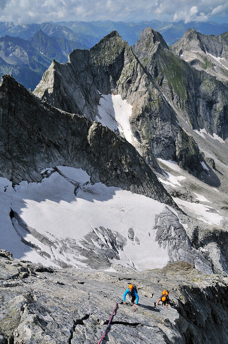 Two mountaineers at the northridge of Grundschartner, Zillertaler Alpen, Tirol, Austria