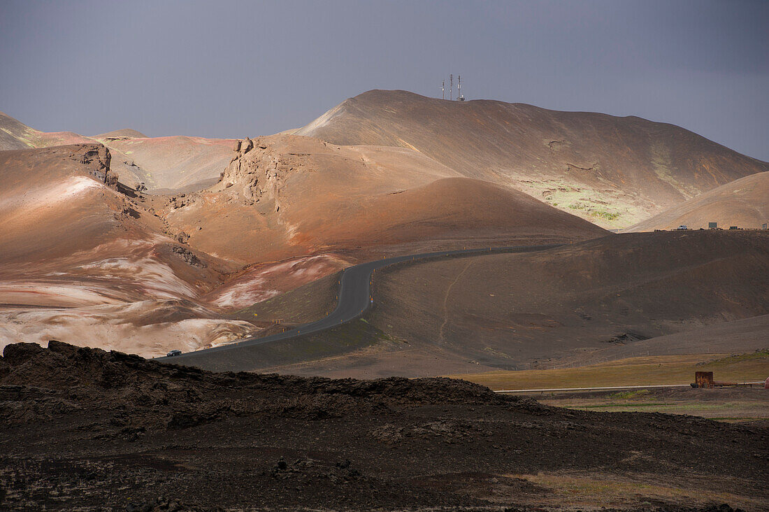 Road through volcanic landscape, Krafla, Nordurland Eystra, Iceland