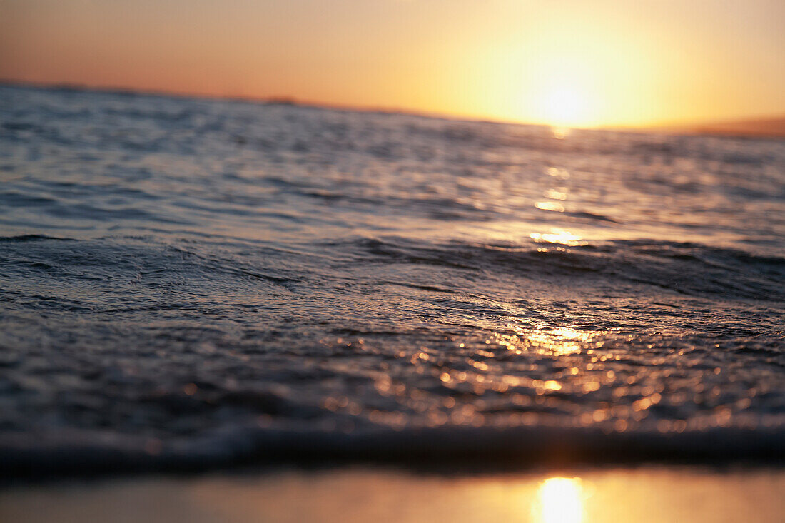 'Sunlight reflecting off the water at sunset;Honolulu hawaii united states of america'