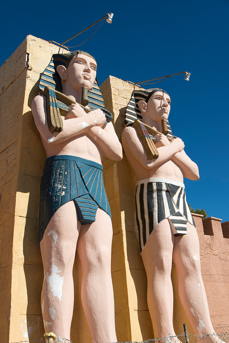 Two statues of Egyptian male figures