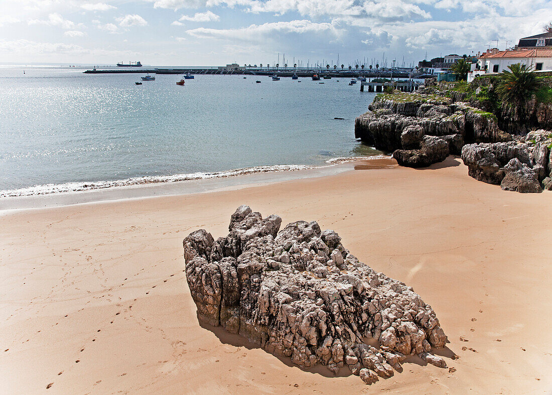 'Praia da rainha beach and boats mooring in the harbour;Cascais portugal'