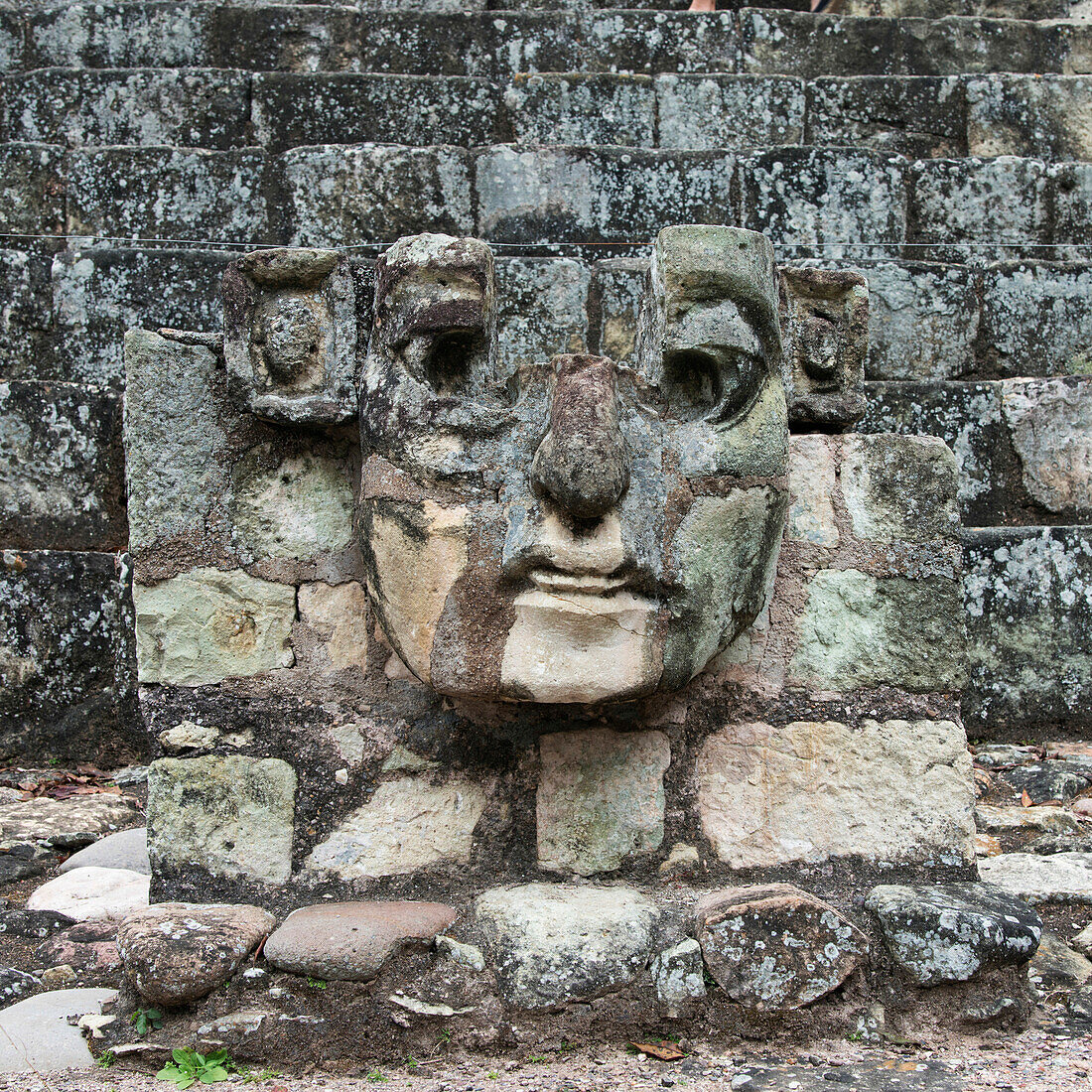 'A Stone Face Carved Into A Stone Wall In A Maya Civilization At Copan Ruins; Copan, Honduras'